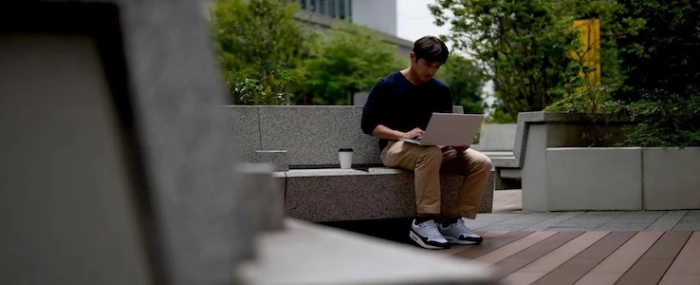 developer-working-on-a-laptop-outdoors
